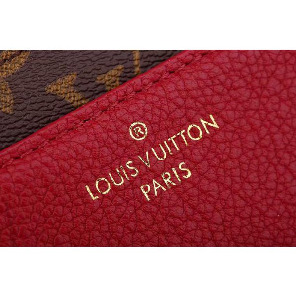 Louis VUITTON Victoire bag in Monogram canvas and black…