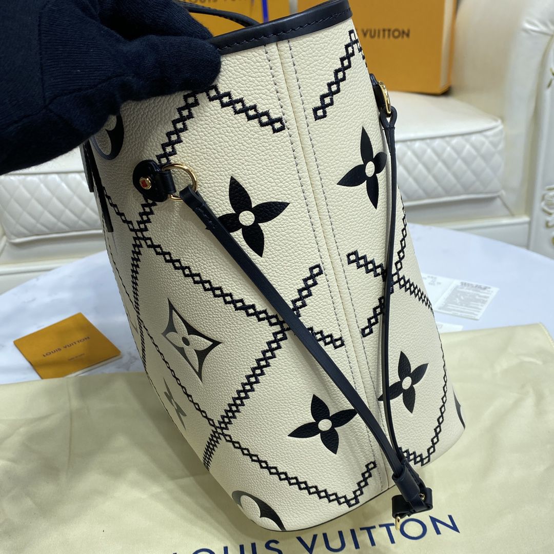 #m46039 l**is V*t*n monogram empreinte neverfull mm tote bag
