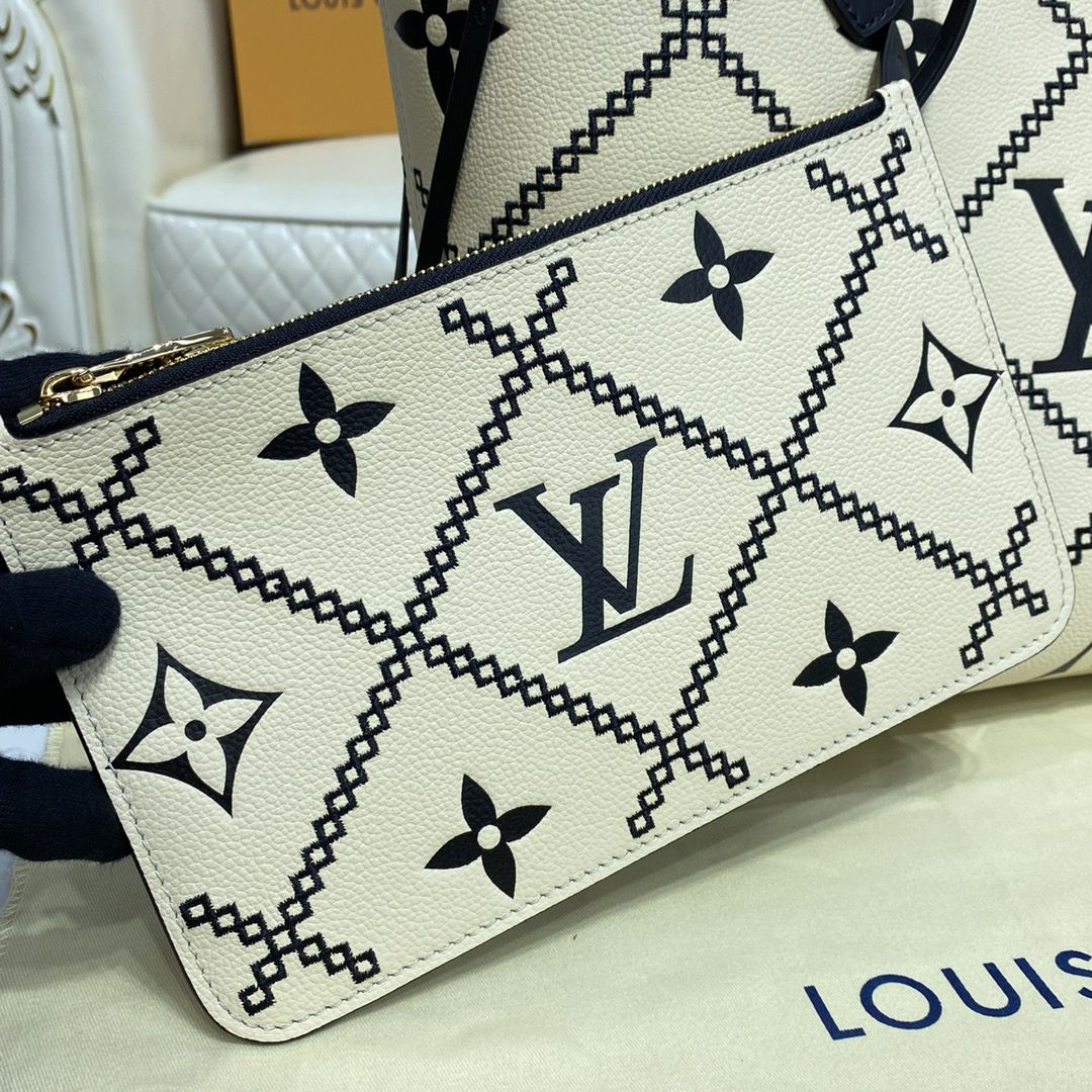 #m46039 l**is V*t*n monogram empreinte neverfull mm tote bag