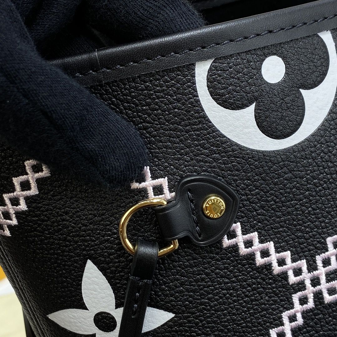 #m46040 l**is V*t*n monogram empreinte neverfull mm tote bag