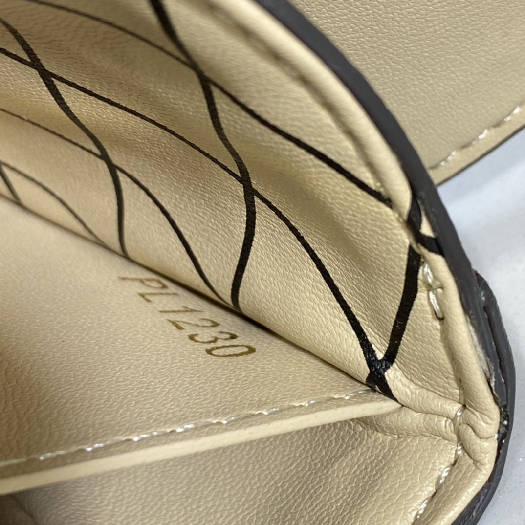 #M63913 Monogram Canvas Vertical Trunk Pochette
