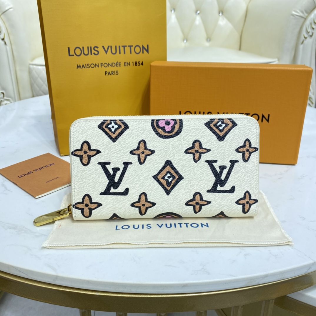 #m80676 l**is V*t*n wild at heart zippy wallet