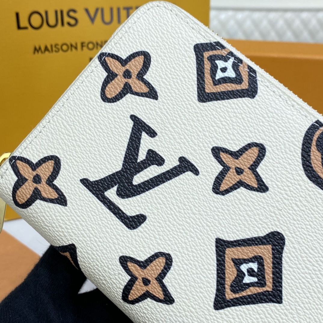 #m80676 l**is V*t*n wild at heart zippy wallet