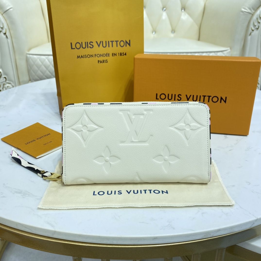 #m80685 l**is V*t*n wild at heart zippy wallet