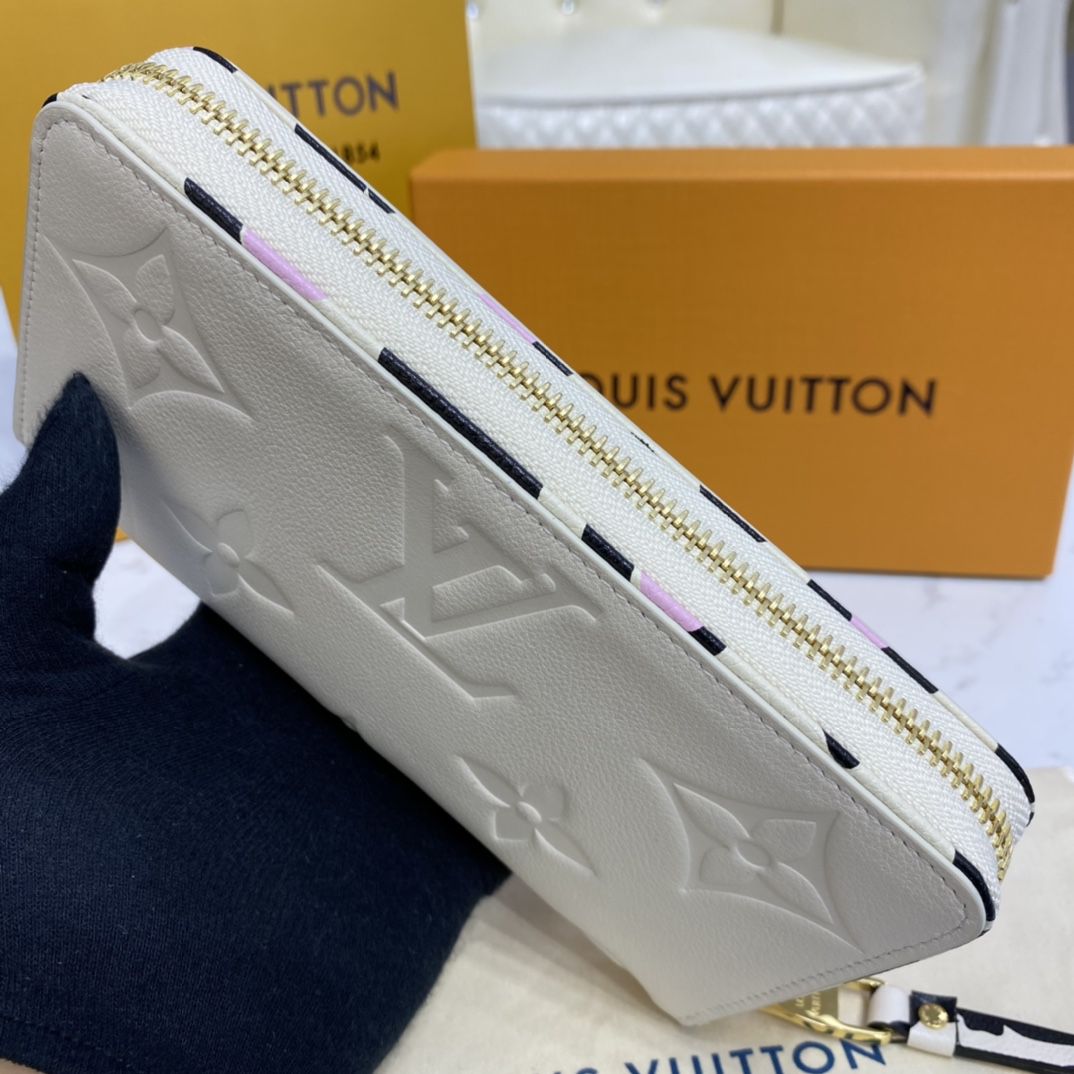 #m80685 l**is V*t*n wild at heart zippy wallet