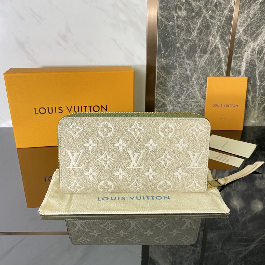 #m81280 l**is V*t*n monogram empreinte zippy wallet